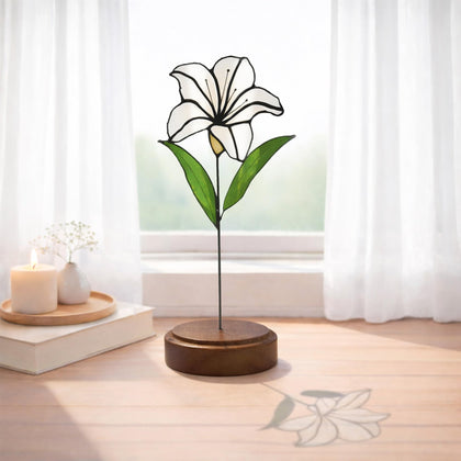 Verssure stained glass flowers with walnut base catching sunlight for bright home decor.