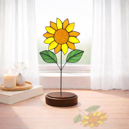 Verssure stained glass sunflower on walnut base enhances sunlit shelves with warm color reflections