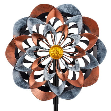 VEWOGARDEN 360° wind spinner close-up shows copper-toned floral design and sunlit shimmer