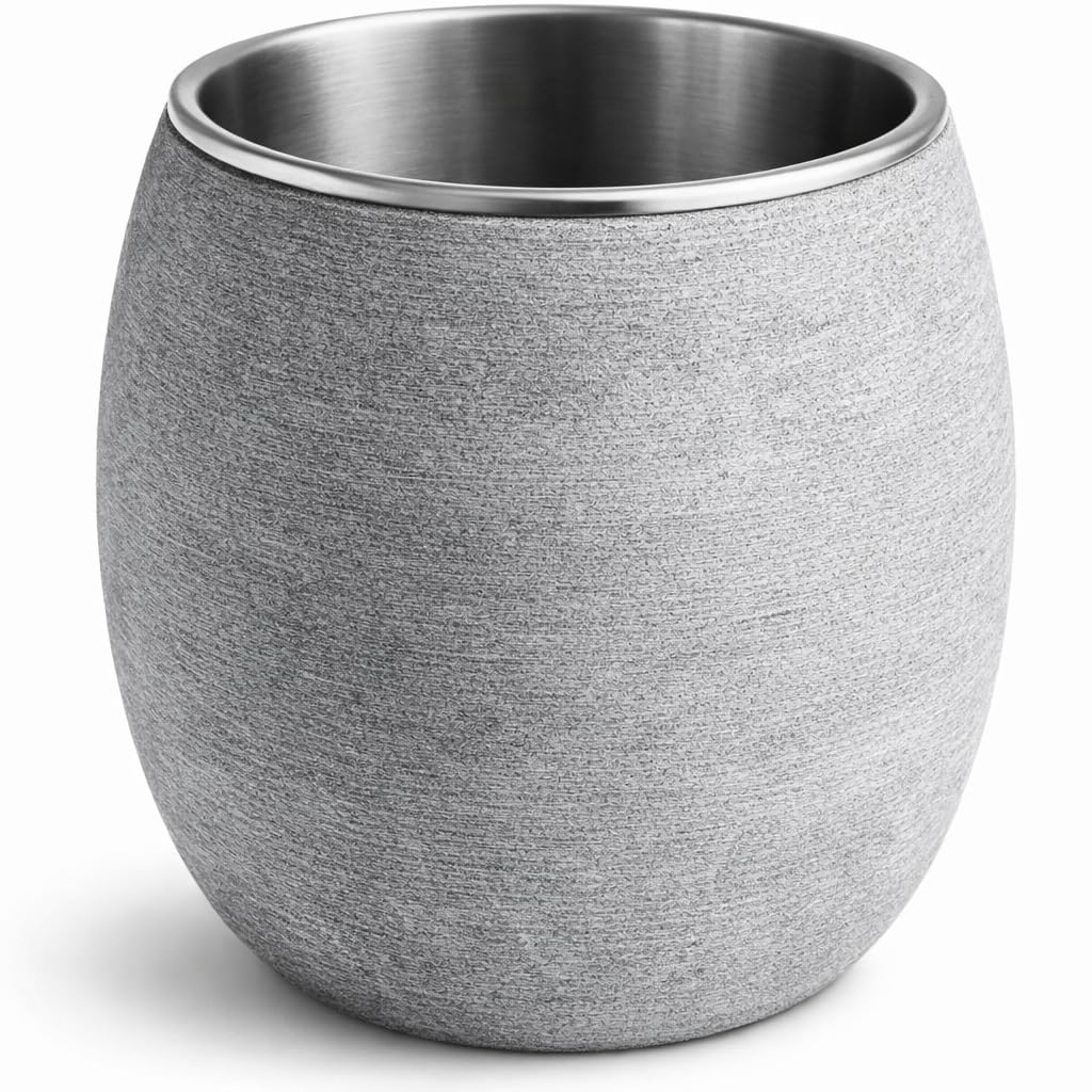 Veyro Large Sauna Diffuser on sauna rocks delivering gentle aroma diffusion.