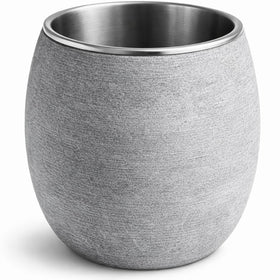 Veyro Large Sauna Diffuser on sauna rocks delivering gentle aroma diffusion.