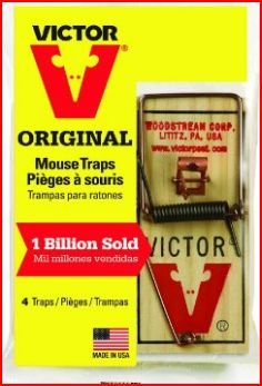 Victor m154 metal pedal mouse trap with wood base designed for quick, safe capture.