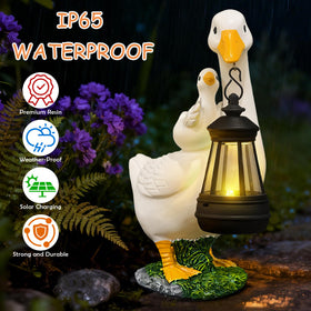 ViQuHaT goose statue back view, pairs with other yard decor