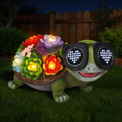 ViQuHaT solar turtle garden statue glowing at dusk for outdoor spaces