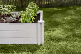 Vita Classic bed in garden setting illustrates deep-root vegetable potential