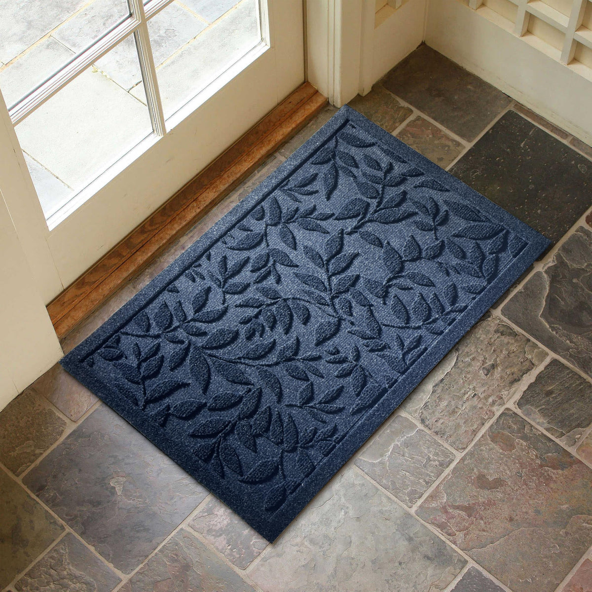 VivaNest heavy-duty welcome mat for outdoor use provides floor protection.