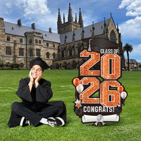 Vivantia orange yard decor enhances graduation photo moments and outdoor ceremony backdrops.