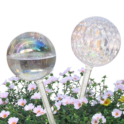 Vividaire iridescent glass watering globe in hand enables easy travel-friendly plant care