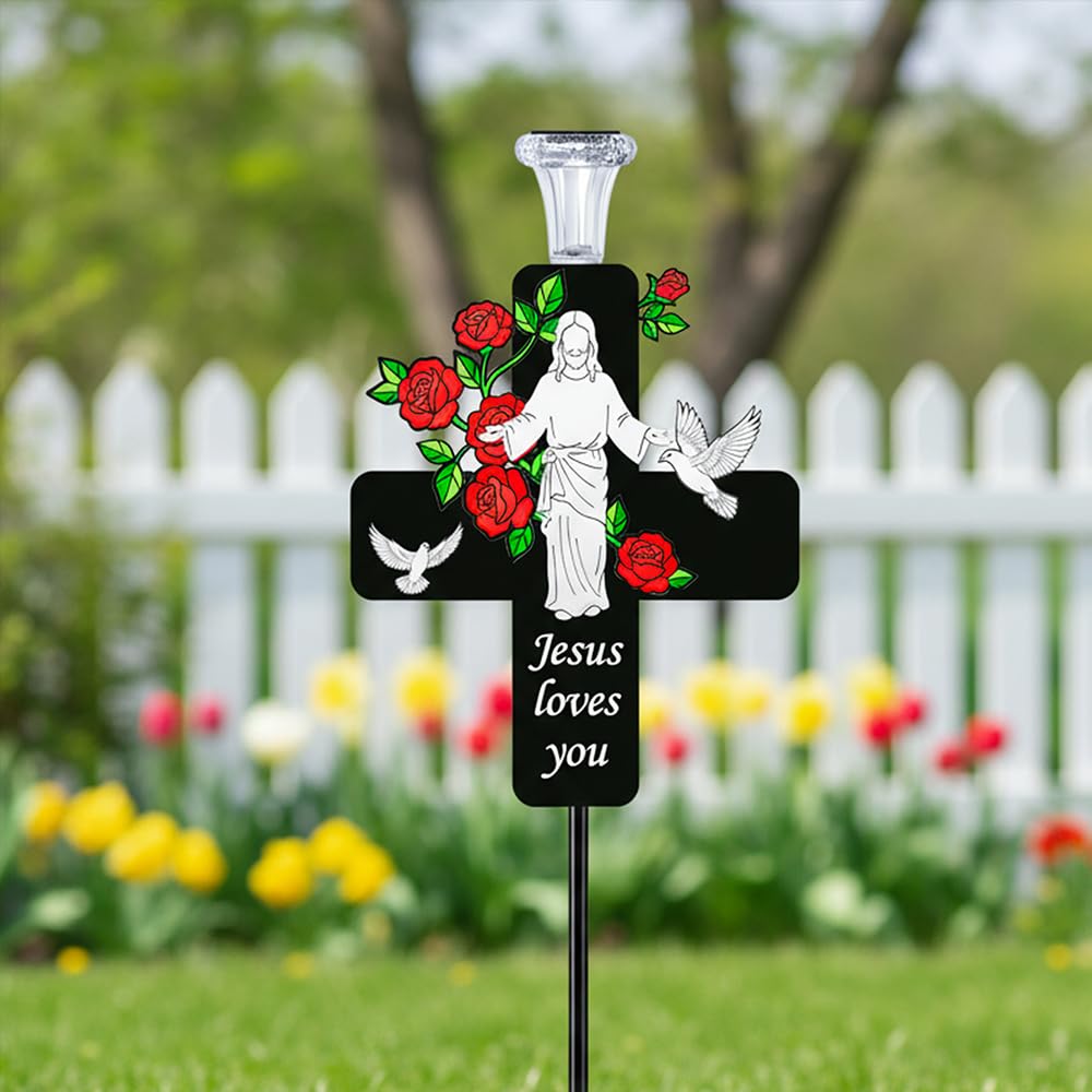 VKEVOC memorial stake detail shows crucifix and roses up close