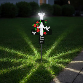 VKEVOC cross stake at dusk-lit display enhances sacred garden spaces