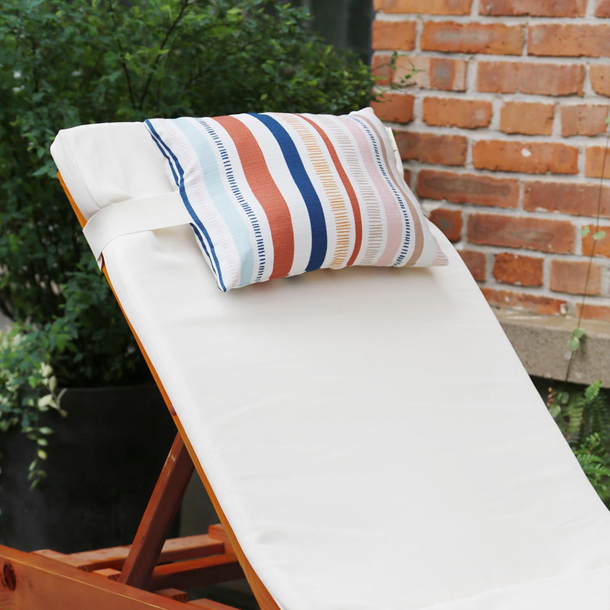vmgreen head-rest pillow for Adirondack chair provides relaxed support during sun sessions.