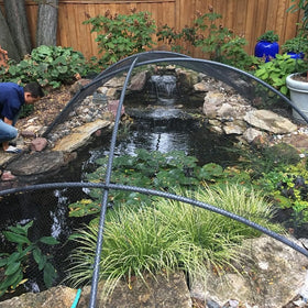 Vocray koi pond netting blocks leaves while allowing light and water flow.