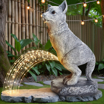 VOFSTAND garden dog statue with solar light for nighttime ambience.
