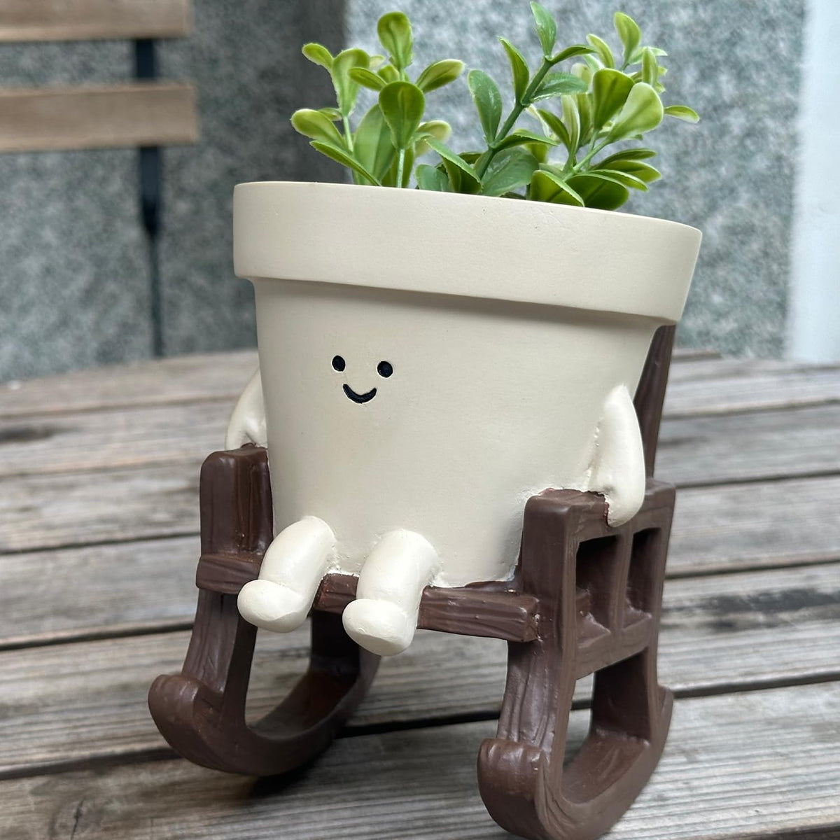 Vovkokc rocking-chair head planter adds whimsy to desks and shelves.