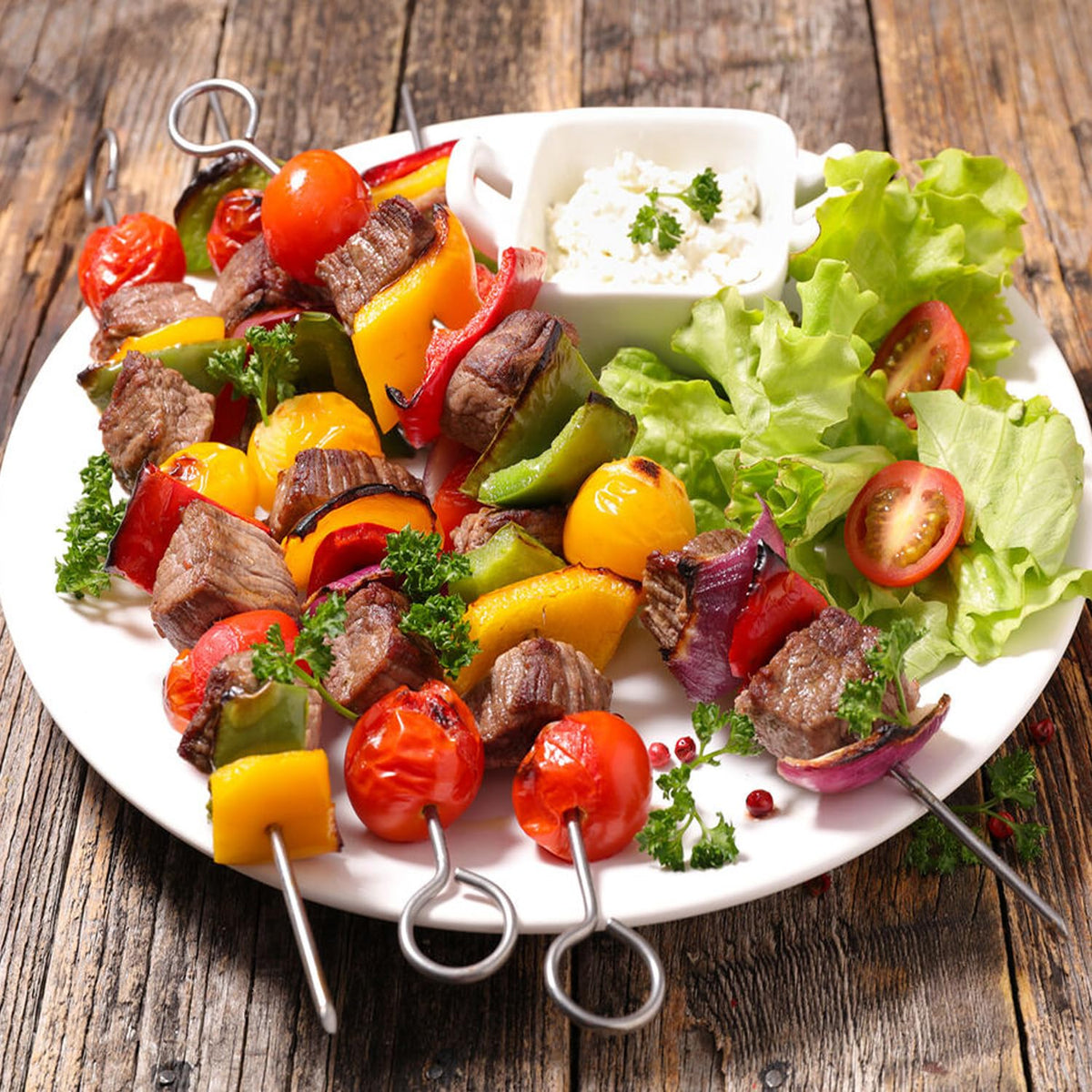 VYNFLICK hanging rack keeps skewers organized for next BBQ