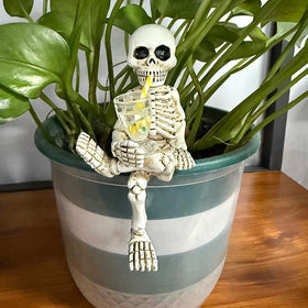 WACSLDN yellow cup skeleton statue adds cheerful accent to porches.