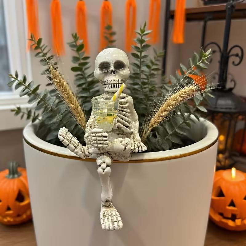 WACSLDN compact skeleton figure pairs with small planters and pots.