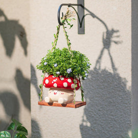 Walasis mushroom planter decorating a window for home decor
