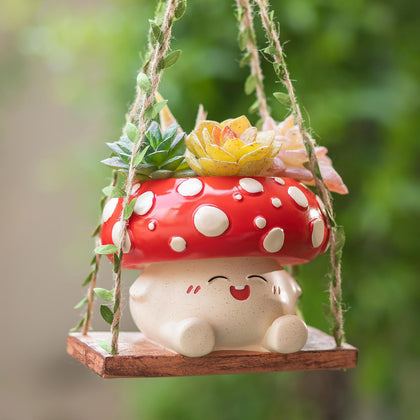 Walasis mushroom planter with 3.9-inch opening shown with small succulents