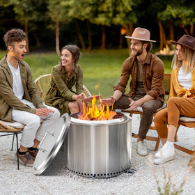 Wanchao round lid used as flat surface for drinks and snacks.