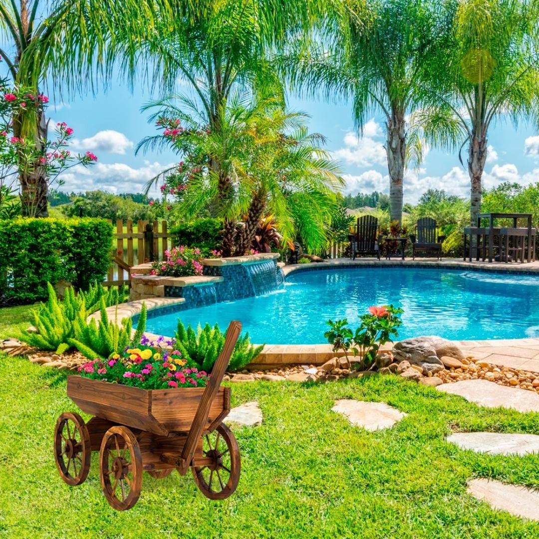 Watbick Wood Wagon Planter on balcony with wheels for easy movement.