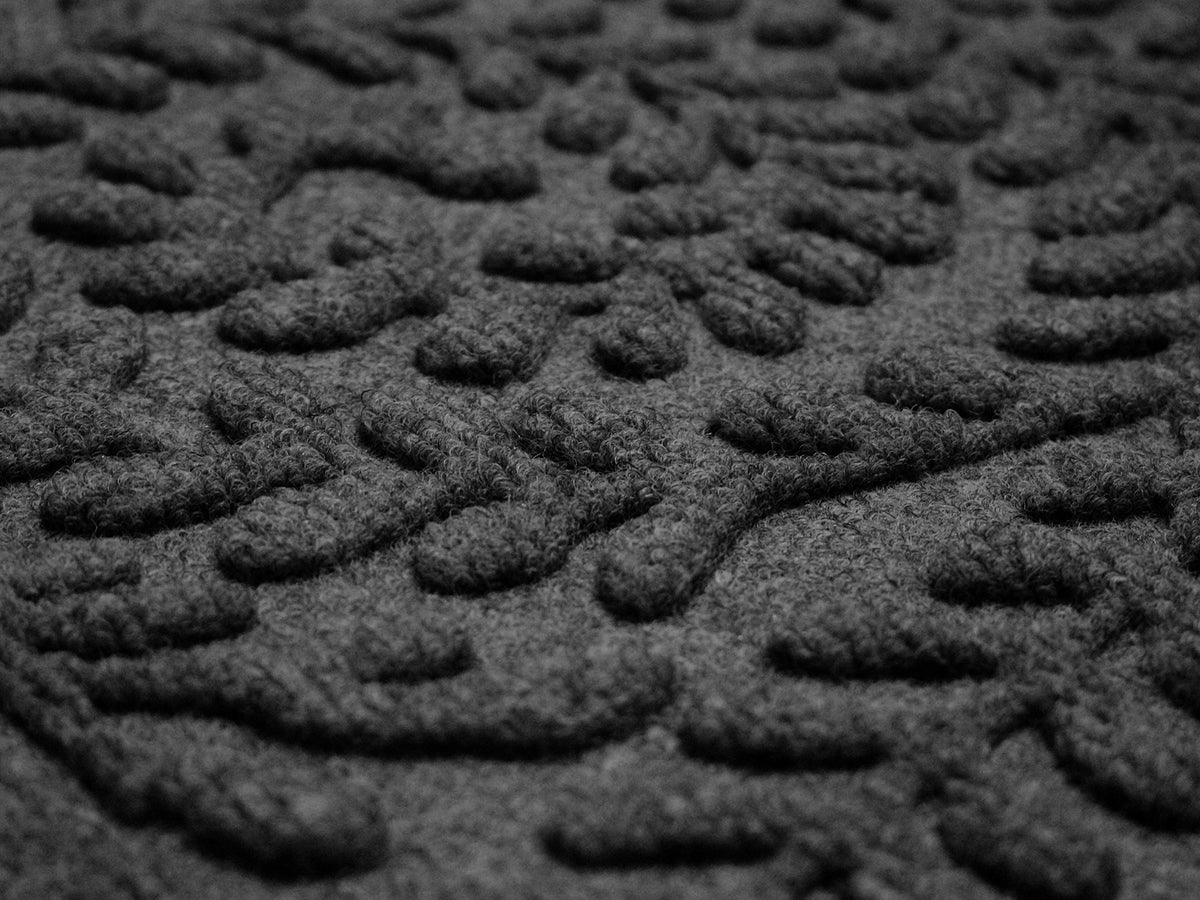 WaterHog Boxwood recycled-material content promotes sustainable heavy-duty mats.