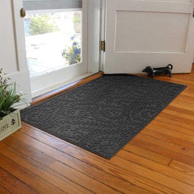 WaterHog Boxwood ridged floral water-trap design captures moisture to protect floors.