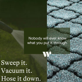 WaterHog Cordova low-profile mat fits under doors without obstruction.