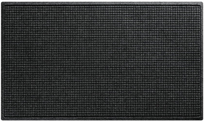 WaterHog Squares Front Door Mat near entrance traps moisture and dirt effectively.