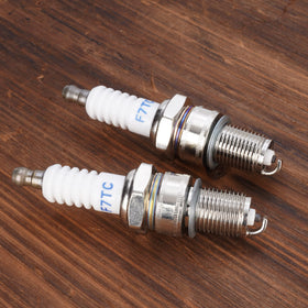 Two-pack Watoday spark plugs ready for replacement and maintenance.