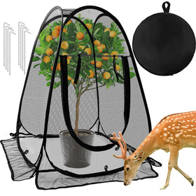 Waybas pop up mesh plant protector covering a garden bed to deter wildlife.