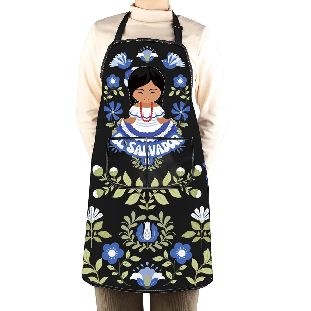 Gift-ready WCGXKO apron featuring Salvadoran floral design