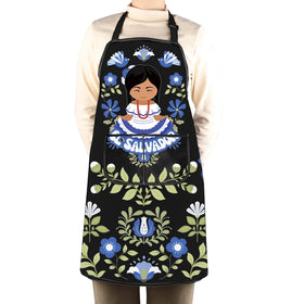 Gift-ready WCGXKO apron featuring Salvadoran floral design