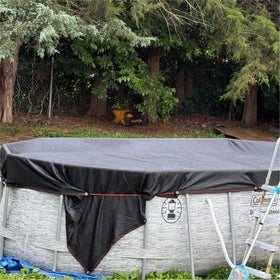 Cover over pool keeping leaves and debris out