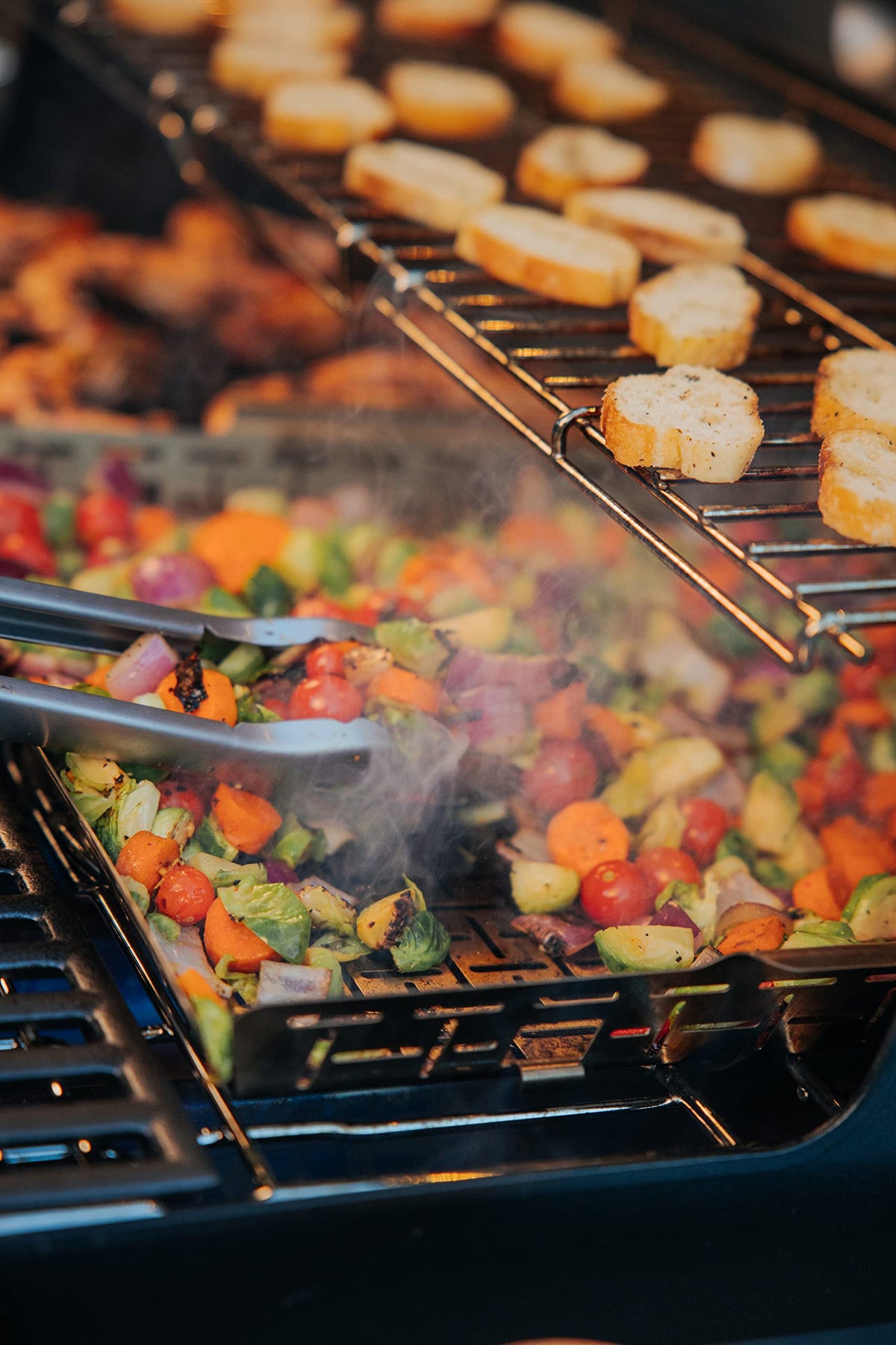 Weber Crafted Roasting Basket holding delicate seafood securely.