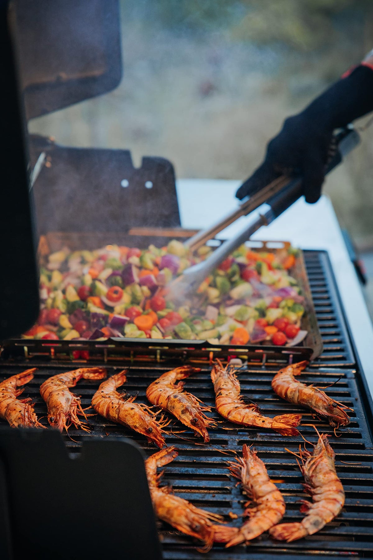 Weber Crafted Roasting Basket with small meat pieces roasting evenly.