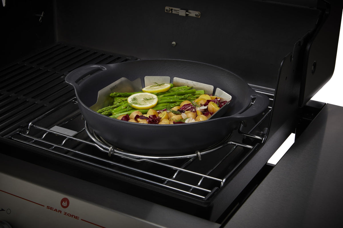 Weber Crafted Wok and Steamer preserves heat for quick cooking