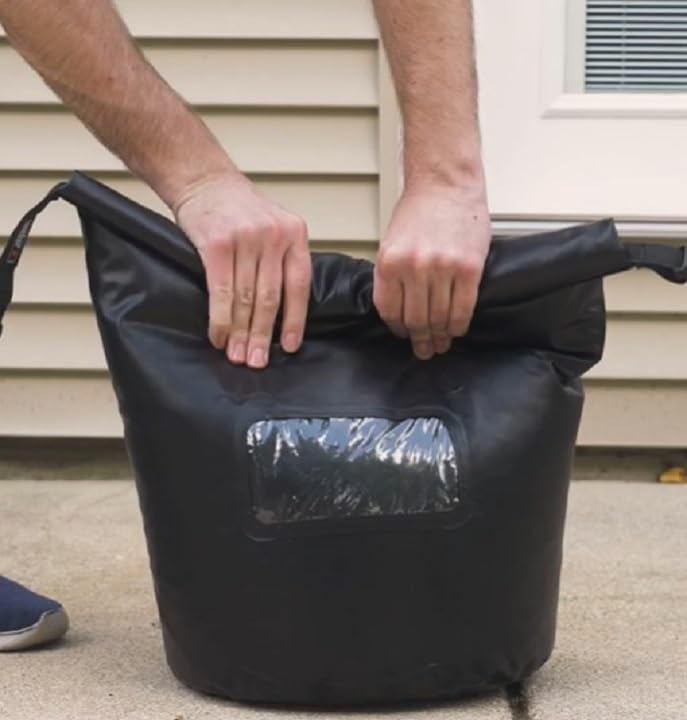 Weber 20-lb capacity bag holds pellets or charcoal for multiple grilling sessions