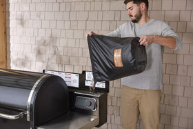 Pellets storage in Weber bag for tidy backyard setups