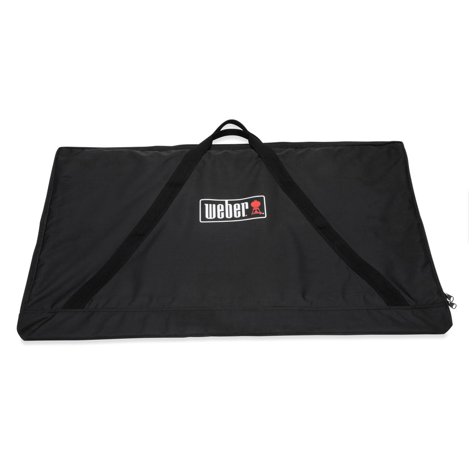 Weber full-size griddle storage bag with weather-resistant protection and durable handles.