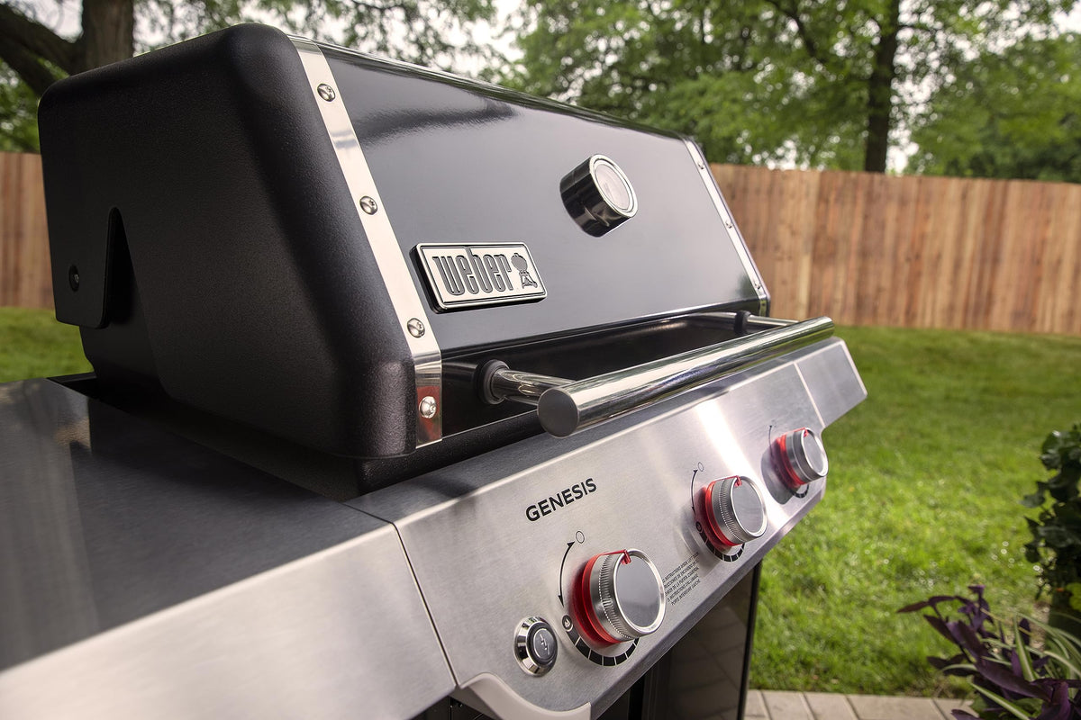 Weber Genesis E-315 porcelain-enameled cast-iron grates retain heat for searing