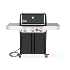 Weber Genesis E-325 with PureBlu burners delivering consistent heat across the grill surface.