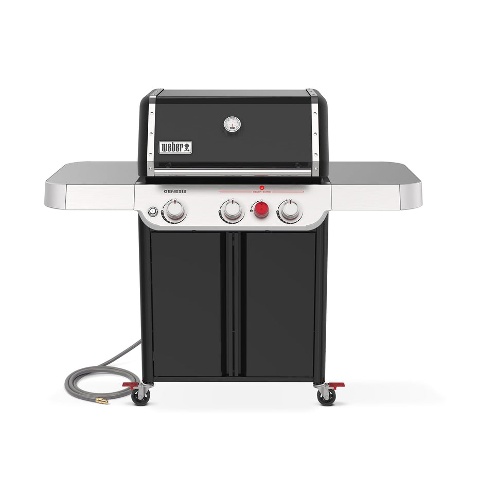 Weber Genesis E-325 with PureBlu burners delivering consistent heat across the grill surface.