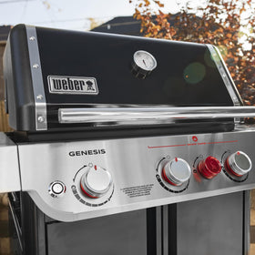 Weber Genesis E-325 raised flame openings keep the flame clear for steady cooking.