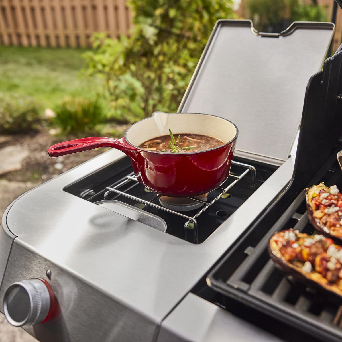 Weber Genesis E-335 porcelain-enameled cast-iron grates retain heat for searing.