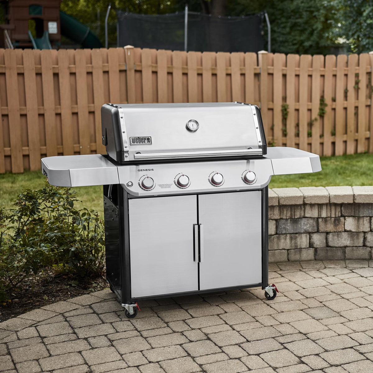 Weber Genesis S-415 grease management system with pull-out tray simplifies cleanup.