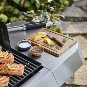 Weber Genesis S-315 raised flame openings prevent debris and ensure reliable ignition