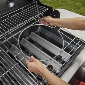 Weber Genesis S-335 side burner with storage locker for sauces and sides.
