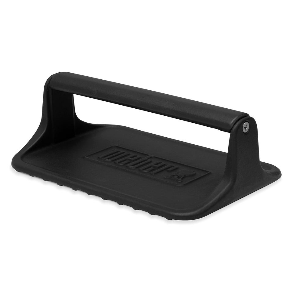 Weber Griddle Press keeps bacon flat and crispy for even cooking.
