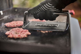 Weber Griddle Press is easy to clean with warm soapy water.